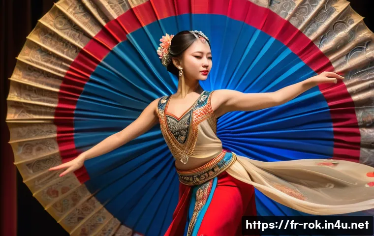 부채춤 공연 일정 - A graceful female dancer performing a traditional fan dance on stage in Paris, wearing a richly embr...